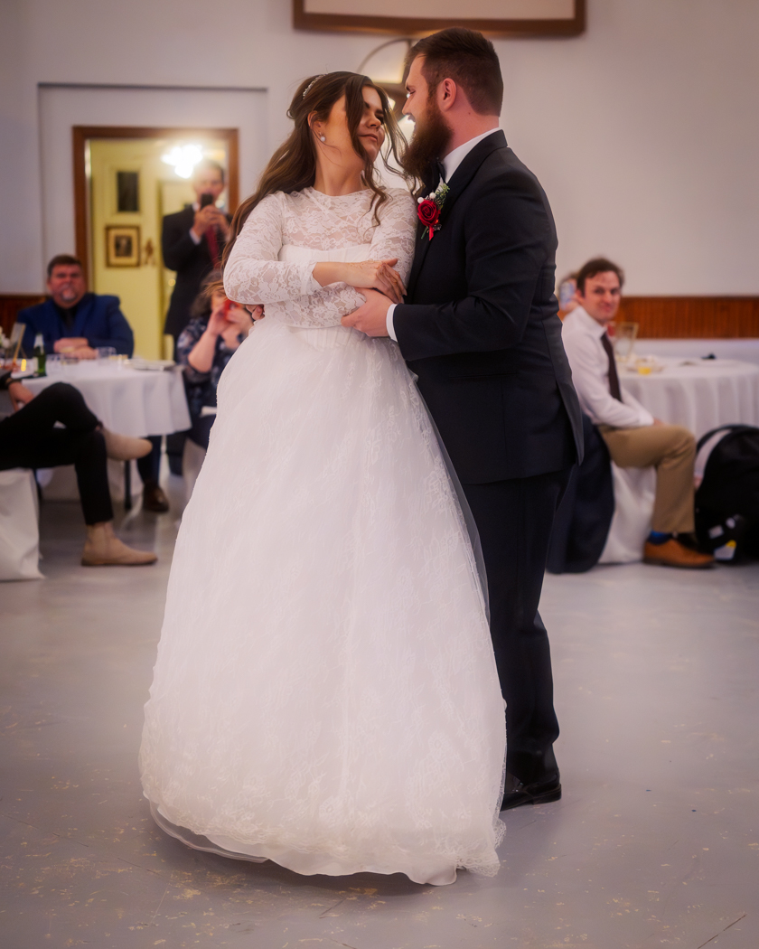 classic-wedding-texas-bride-groom-dance A husband and wife have their first dance after being married.